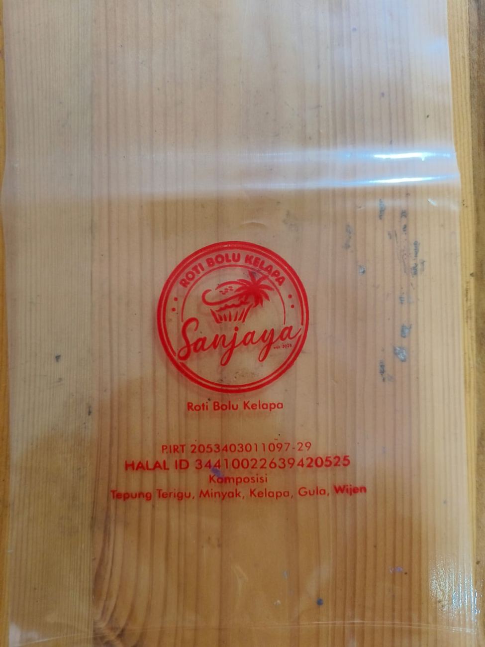 Sablon kemasan Roti Bolu Kelapa Sanjaya